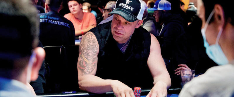 Image of Eric Person playing at a table